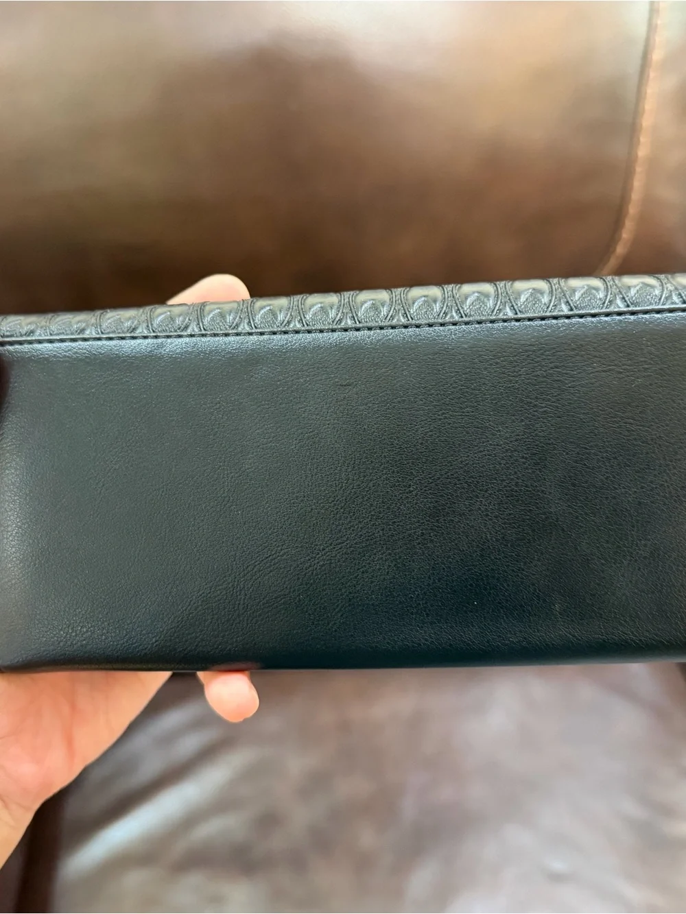 N/A black embossed